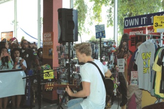 Photos by Elyse Riva/The Runners Cody Simpson performing for the first 100 people who bought is CD Sunday October 13,2013 at FYE.