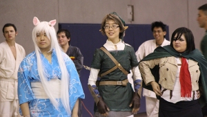 Juana Martinez/The Runner Nisha K. Vanakarnkovit (left), 19, and Lisa Fong (Center), 20, lined up to show their costumes.