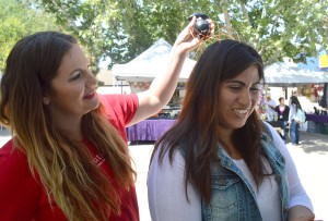 Marisel Maldonado/The Runner Heather Mooren, Beauticontrol consultant, performs a spa treatment on CSUB freshman Rosie Gonzales at the CSUB Staff Forum Craft Fair put on in the Runner Quad Café on May 5.