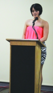 Bre Williams/The Runner Kaitlin Leather, an English major, read a poem on conception in the Stockdale Room on May 16 at the Gender Matters Conference. 